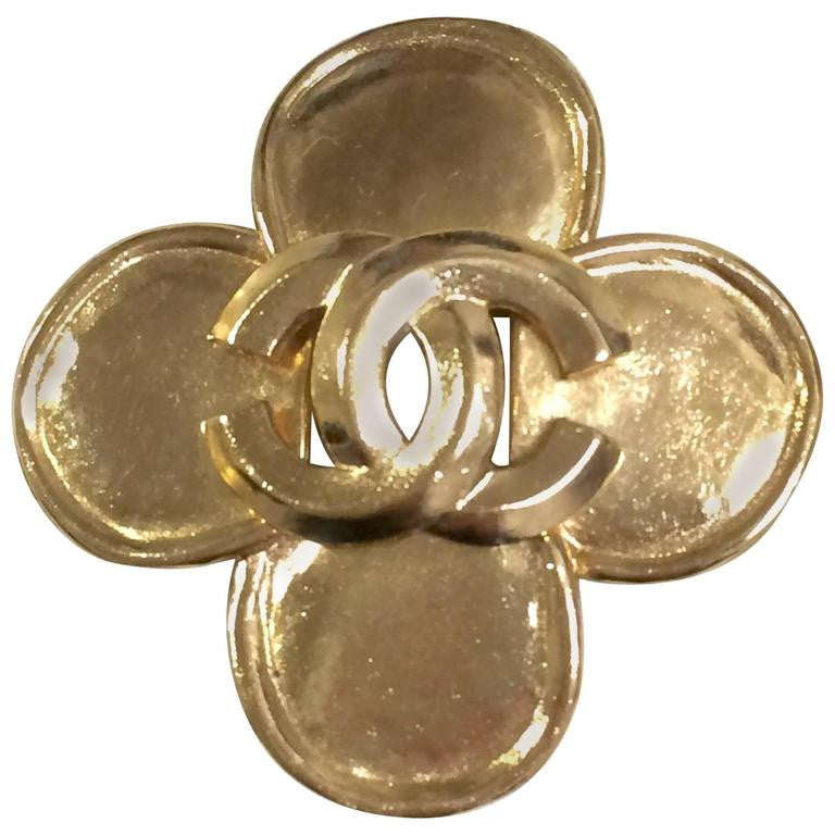 MINT. Vintage CHANEL Gold tone flower, clover brooch with CC mark. Ele – eNdApPi  ***where you can find your favorite designer vintages..authentic,  affordable, and lovable.