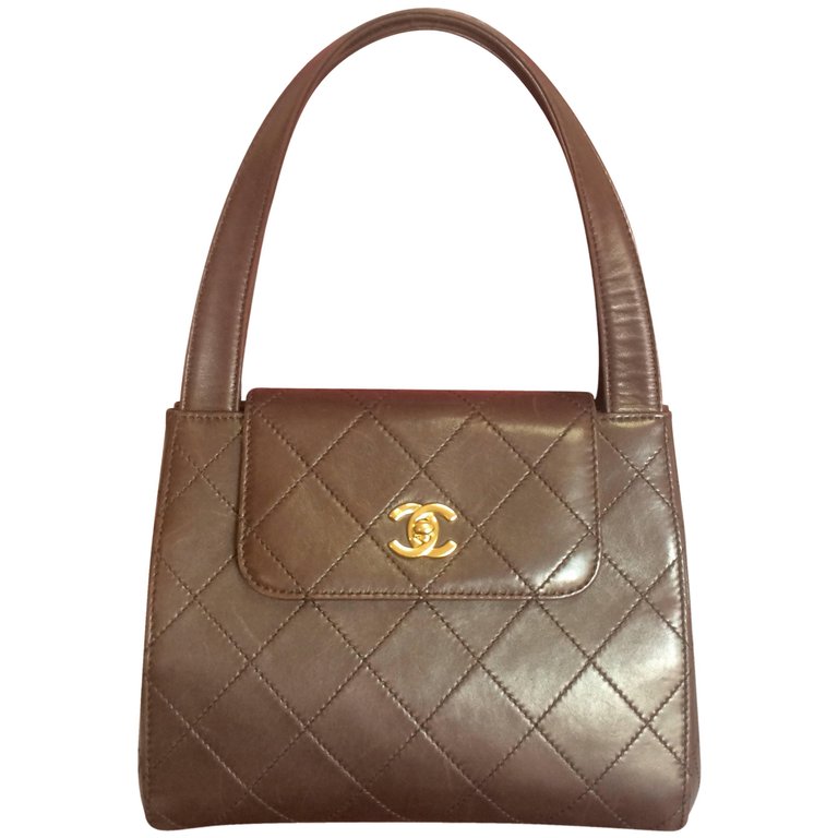 Vintage CHANEL chocolate brown leather trapezoid shape handbag with go –  eNdApPi ***where you can find your favorite designer  vintages..authentic, affordable, and lovable.