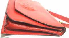 Vintage FENDI genuine red leather classic handbag with iconic Janus medallion embossed motif at front.