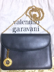 Vintage Valentino Garavani, gray leather chain shoulder bag with golden round V motif charm. Can be clutch bag as well.