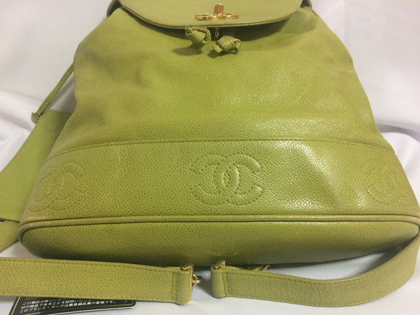 Vintage CHANEL green caviar leather backpack with gold chain strap