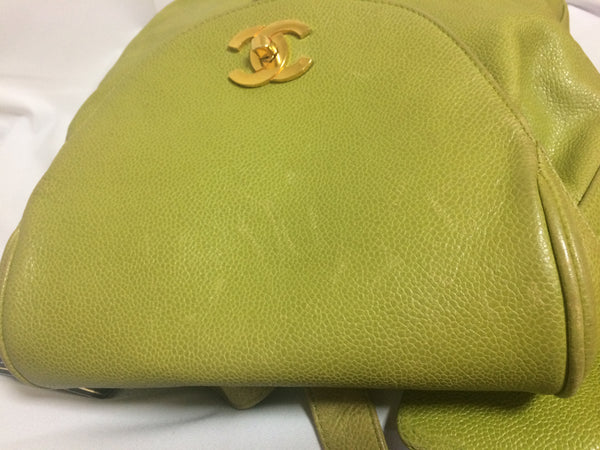 Vintage CHANEL green caviar leather backpack with gold chain strap and CC  closure. Classic but rare color.