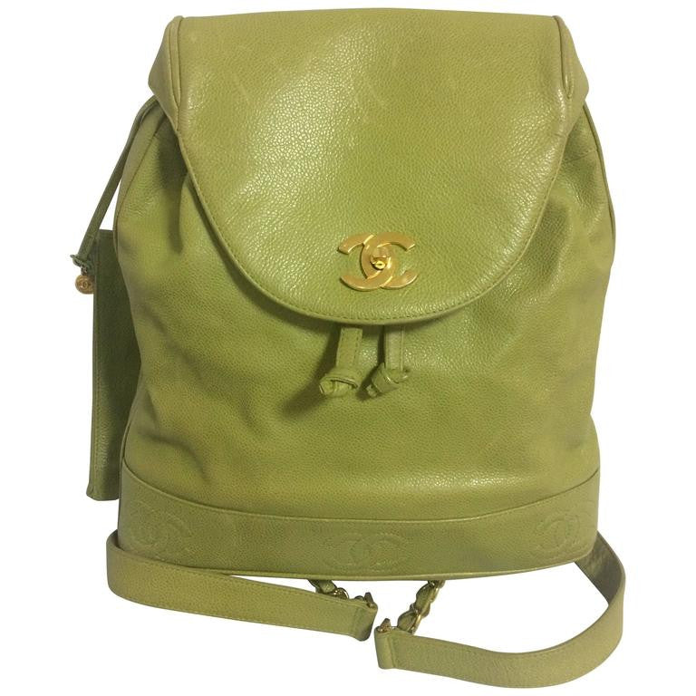 Vintage CHANEL green caviar leather backpack with gold chain strap