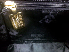 Vintage MOSCHINO black patent enamel leather shoulder bag with red heart motif at closure.  Must have mod purse by Red Wall.