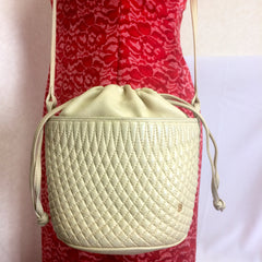 Vintage BALLY ivory white quilted lambskin mini hobo, bucket shoulder bag with golden B charm and drawstrings.