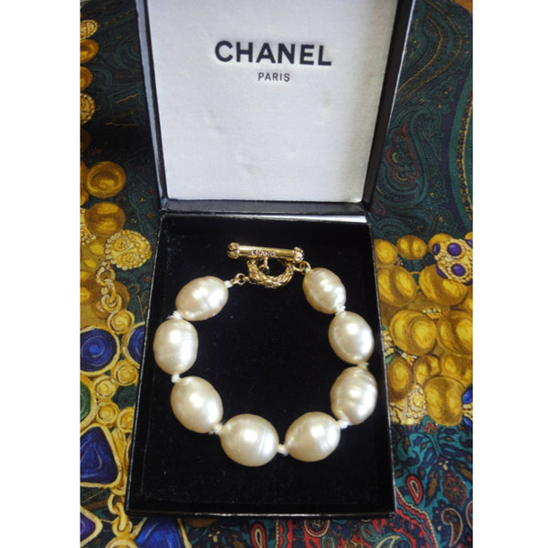 Vintage CHANEL extra large faux baroque pearl bracelet with logo embos –  eNdApPi ***where you can find your favorite designer  vintages..authentic, affordable, and lovable.