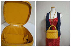 Vintage CHANEL yellow quilted lambskin cosmetic, make up case, vanity bag with CC mark at bottom. Can be a mini handbag. Get a lucky color