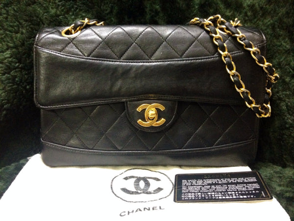 Vintage Chanel classic 2.55 black lambskin shoulder bag with