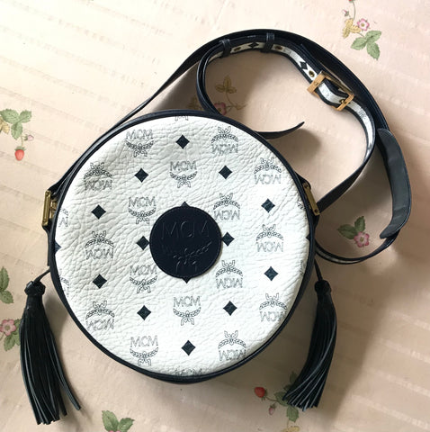 Vintage MCM navy and white monogram round shape Suzy Wong shoulder bag with leather trimmings. Unisex. Designed by Michael Cromer. 0403283
