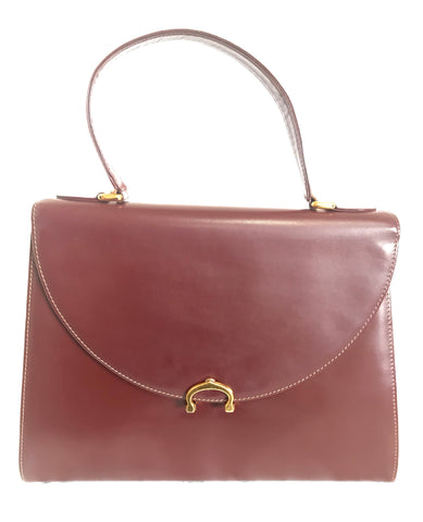 Vintage Cartier Kelly style wine leather handbag with gold-tone closure. les must de cartier collection. Made in Italy.