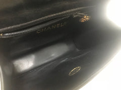 Vintage CHANEL 2.55 black patent enamel fanny pack, belt bag with golden CC motif. Belt size 26" through 30”.