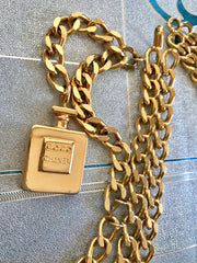 Vintage CHANEL golden double chain belt with logo perfume bottle charm and 3 drop strand design. Rare and Gorgeous belt. Perfect gift.