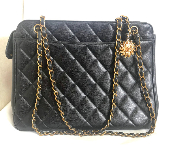 Vintage CHANEL black caviar matelasse chain shoulder bag with golden sun  flower CC mark charm. Classic daily use bag.050315r5