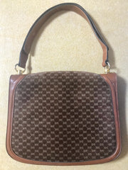 Vintage Gucci brown leather micro GG print shoulder bag with iconic golden large round GG motif. Rare masterpiece purse.