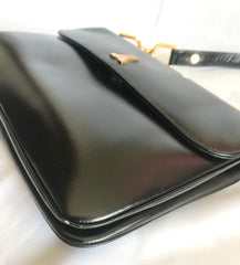 Vintage LANVIN black leather shoulder bag with logo motif. Classic masterpiece.