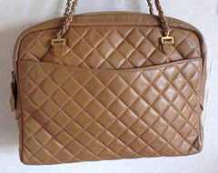 80's Vintage CHANEL brown lambskin large classic bag with double golden chain strap and a CC pull charm.