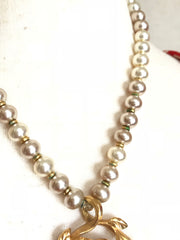 Vintage Lanvin faux pearls and golden arabesque and red stone pendant top statement necklace. Gorgeous German made jewelry masterpiece.