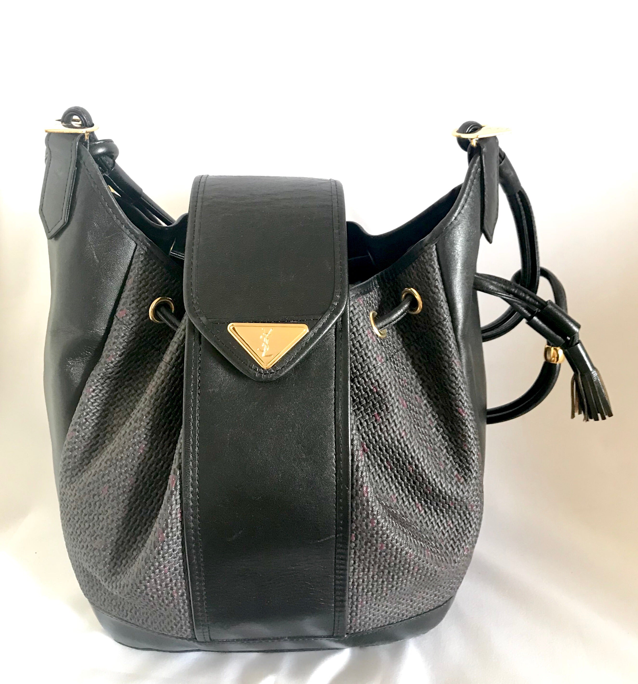 Vintage Yves Saint Laurent  black and purple hobo bucket shoulder bag with leather trimmings and golden logo plate. YSL classic purse.