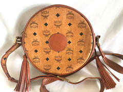 Vintage MCM brown monogram round Suzy Wong shoulder bag with brown leather trimmings. Designed by Michael Cromer. Classic masterpiece bag.