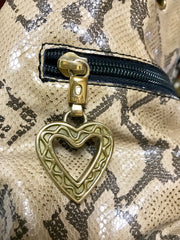 Vintage MOSCHINO by redwall snakeskin print leather mini backpack with golden M logo charm. Perfect chic and mod daily bag.