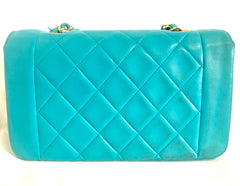 Vintage CHANEL emerald blue 2.55 chain shoulder bag with golden CC closure. Rare color purse. Must have collectible piece.