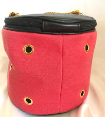 Vintage Moschino by Redwall lunchbox design red jersey and black leather handbag with golden eyelets and ball charms. Must-have chic purse