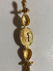 Vintage FENDI gold tone hat pin with white oval faux pearl and FF mark. Can be used as a brooch pin, jacket brooch pin too