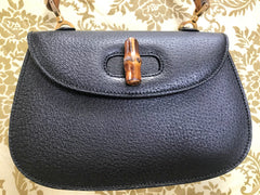 Vintage Gucci genuine pigskin black handbag purse with bamboo handle. Classic purse from collection.