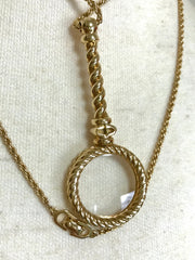 MINT. Vintage Christian Dior long chain necklace with round glass loupe pendant top and CD motif. Rare and gorgeous masterpiece.