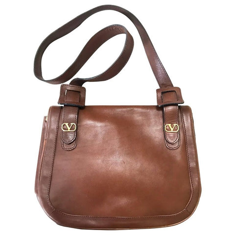 Vintage Valentino Garavani brown nappa leather shoulder bag with V logo motifs at front. Unisex and daily use.