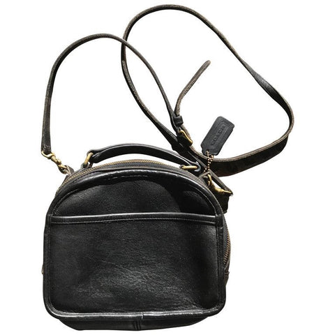 Vintage COACH genuine black leather oval lunchbox shape shoulder bag. Made in USA