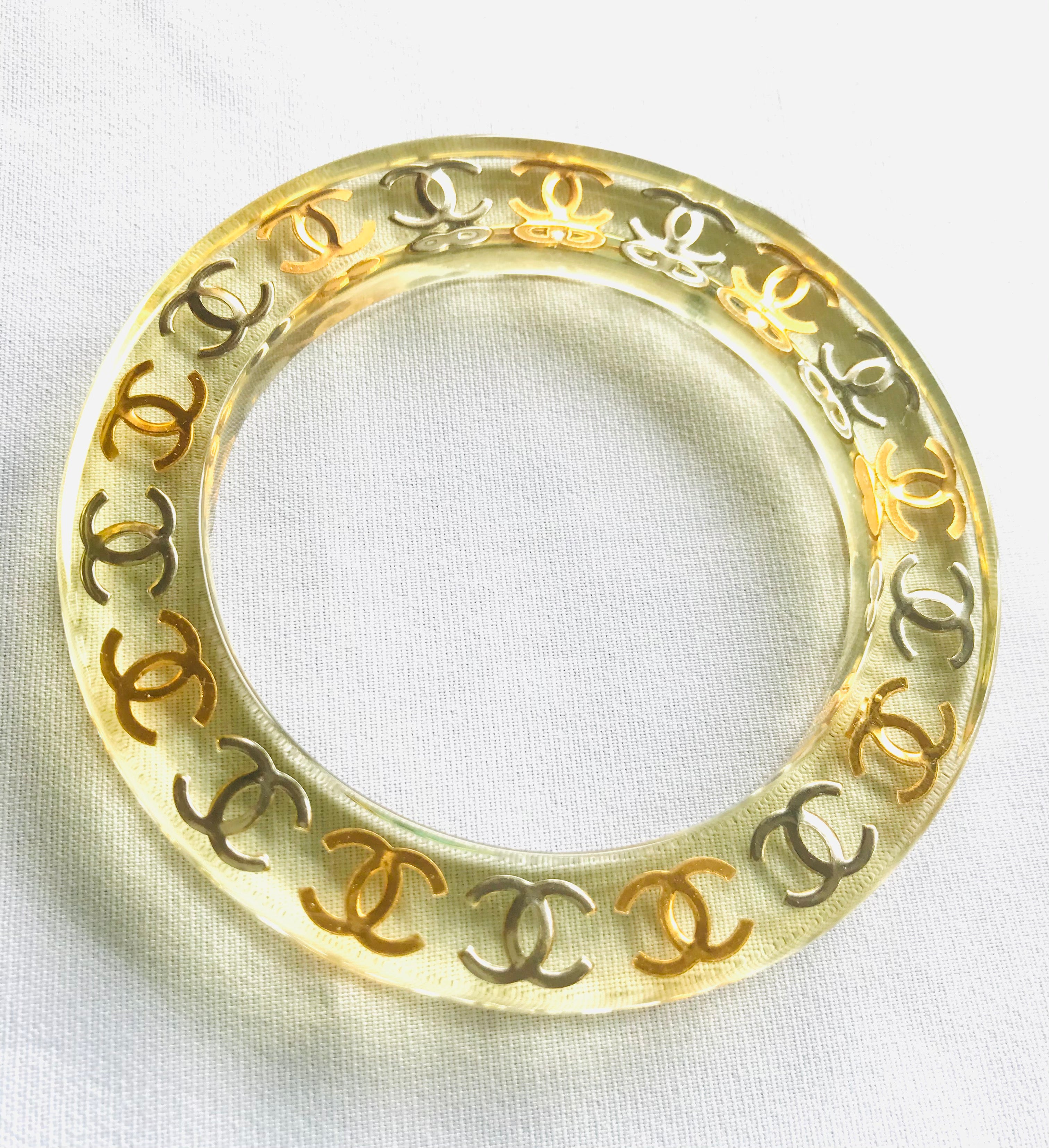 Vintage CHANEL resin bangle, bracelet with gold and silver CC marks. O –  eNdApPi ***where you can find your favorite designer  vintages..authentic, affordable, and lovable.