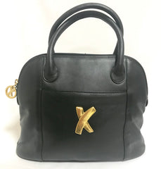 Vintage Paloma Picasso black leather bolide bag style handbag with iconic golden logo motif. Classic shape bag.