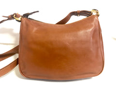 Vintage Fendi brown leather messenger shoulder bag with embossed logo and clear brown and golden motifs. Unisex.