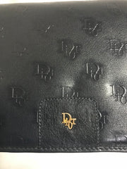 MINT. Vintage Christian Dior navy leather clutch purse, shoulder bag with golden Dior logo motif.