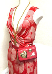 Vintage MOSCHINO red leather waist purse, fanny pack, clutch bag with large golden heart, key motifs, and can budge motif. R0410118