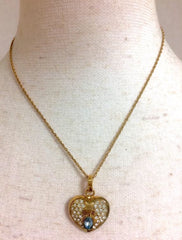 Vintage LANVIN golden skinny chain necklace with heart logo charm pendant top with clear crystals and blue crystal. Perfect jewelry gift.