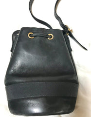 Vintage Salvatore Ferragamo black leather hobo style shoulder bag with vara logo motif and drawstrings. Classic bag for daily use. 050317r1