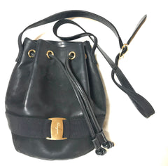 Vintage Salvatore Ferragamo black leather hobo style shoulder bag with vara logo motif and drawstrings. Classic bag for daily use. 050317r1