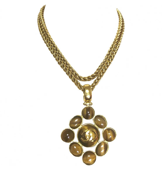 MINT. Vintage CHANEL tiger eye stone and golden CC mark pendant
