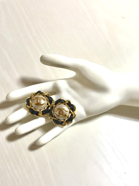 Vintage CHANEL earrings with golden CC, faux pearl, black leather