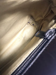 Vintage Bottega Veneta genuine leather shoulder bag with allover faux leopard print and double golden chain straps.