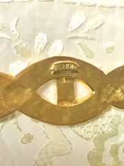 Vintage FENDI gold tone twisted design brooch pin, hat pin with FF mark. Can be used as a brooch pin, jacket brooch pin too