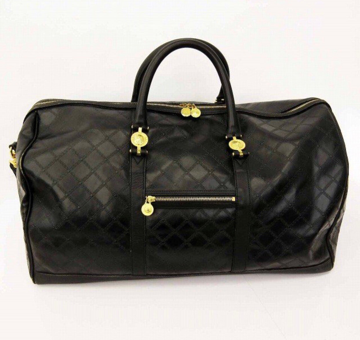 Vintage Gianni Versace genuine black leather travel bag with