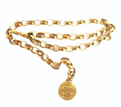 Vintage CHANEL golden chain belt with large CC motif charm. Nice and heavy, rare and Gorgeous accessory.