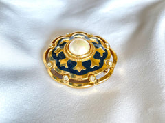 Vintage Burberry faux pearl, crystal stones, and gold and navy tone detailed design brooch. Rare Burberry masterpiece. 0503101