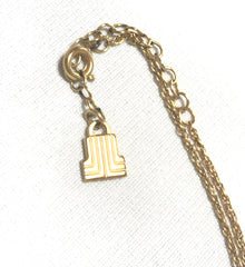 Vintage LANVIN golden skinny chain necklace with square and silver logo charm pendant top. Must have classic vintage jewelry piece.