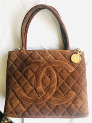 Vintage CHANEL brown suede classic tote bag with large CC mark and golden CC medal charm to the zipper. Classic purse for daily use.