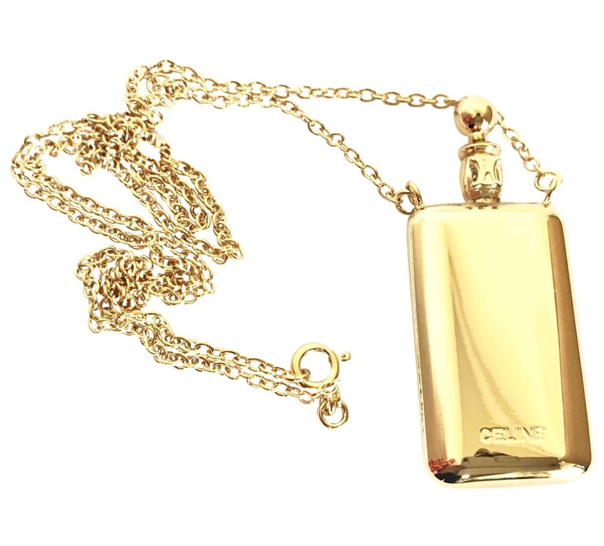 Vintage Celine gold tone long necklace with perfume bottle charm pendant top and blaison logo. Rare old jewelry piece. Must have.