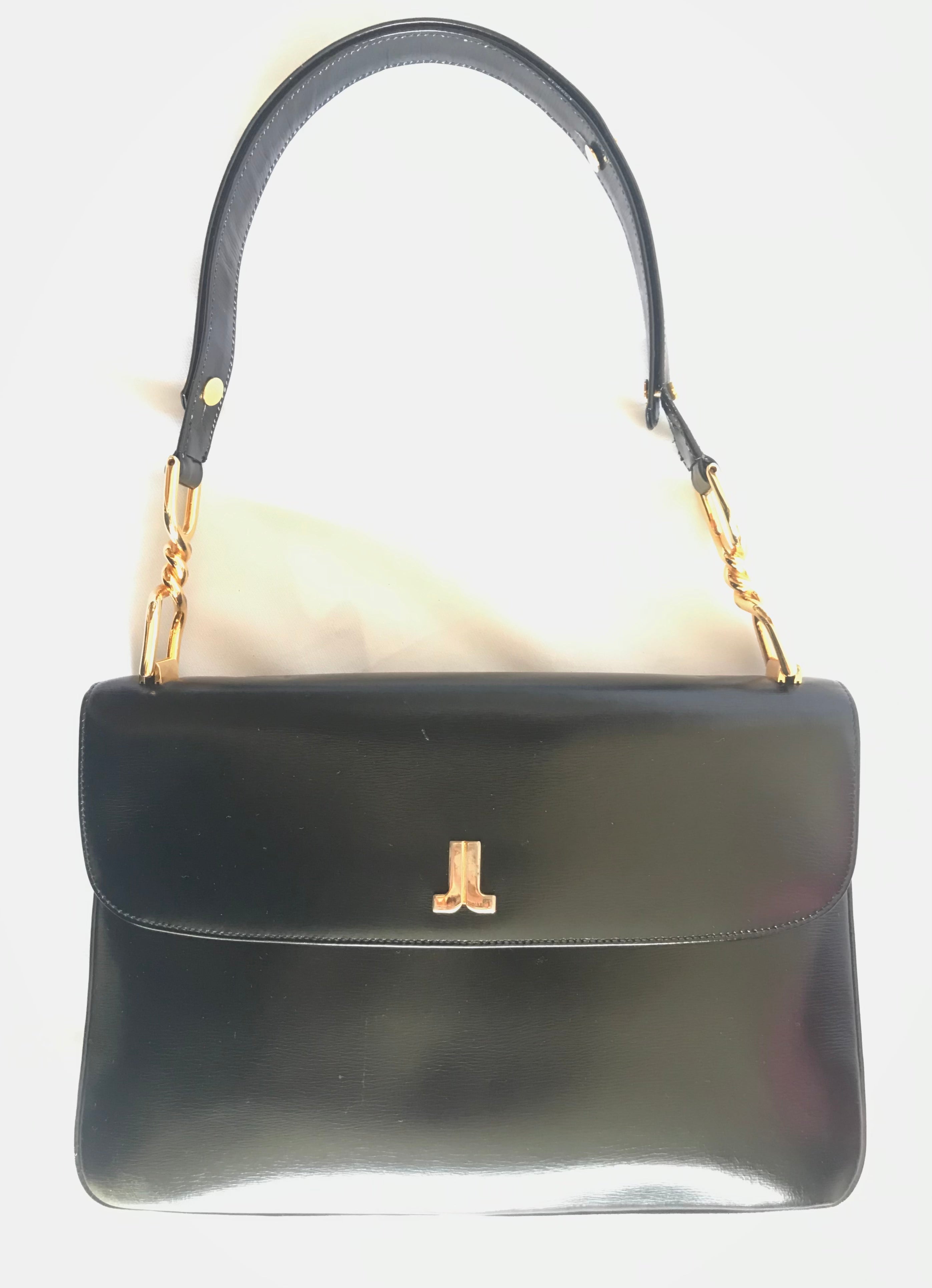 Vintage Lanvin black leather shoulder bag with logo motif. Classic masterpiece. 050320r11